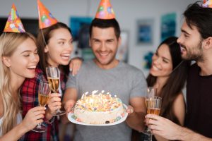 A guy celebrating his 21st birthday with friends