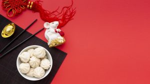 Chinese new year charms and a bowl of dumplings