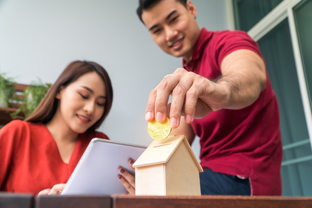 A couple budgeting their wedding