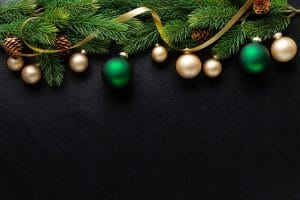 Christmas deco with fir and baubles on dark