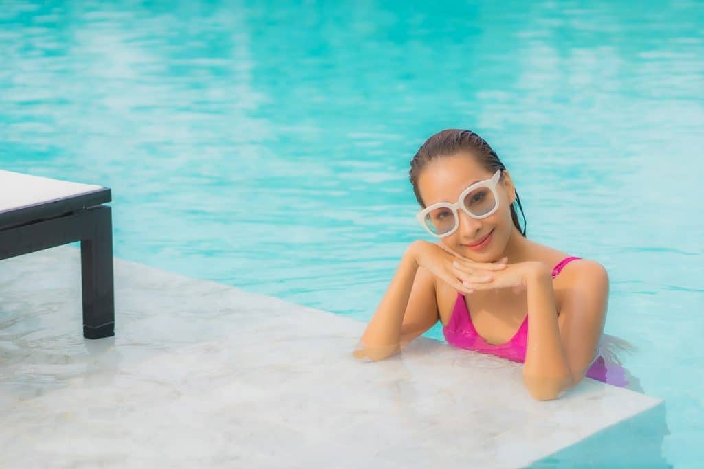 Portrait beautiful young asian woman relax smile around outdoor